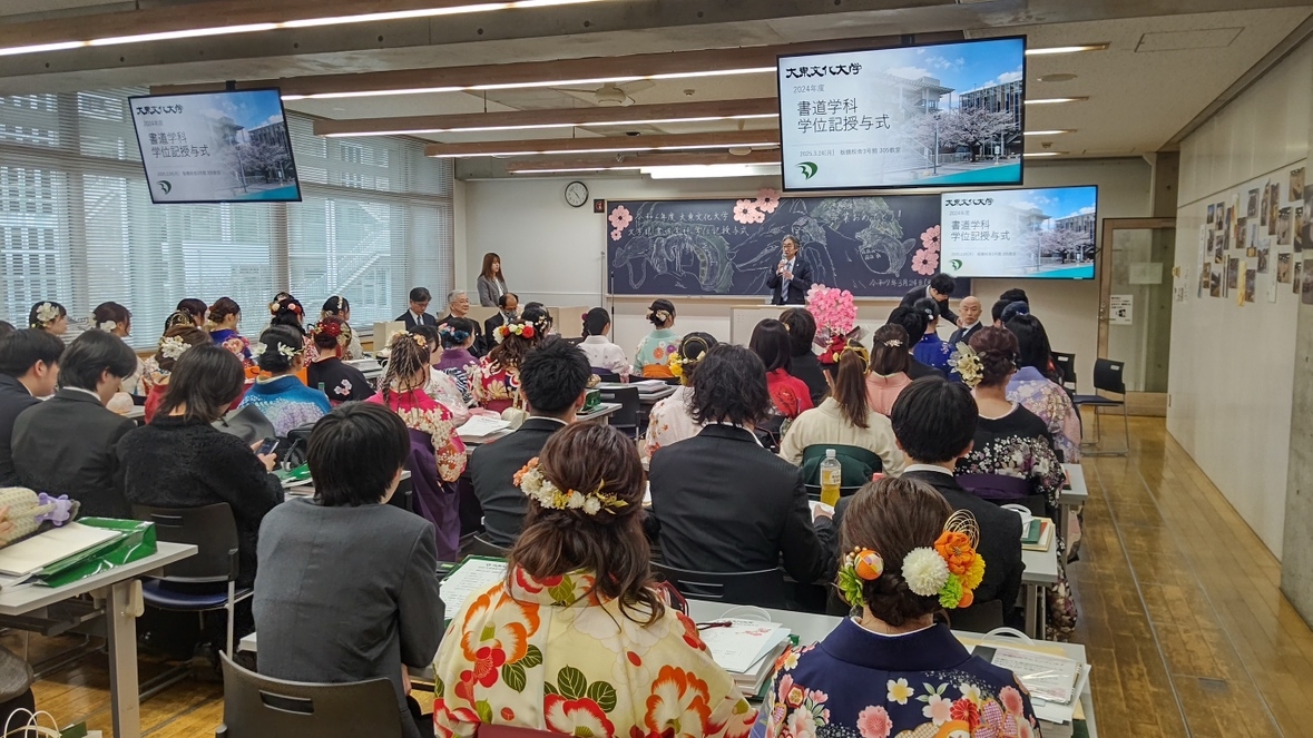 綿引主任による学事報告